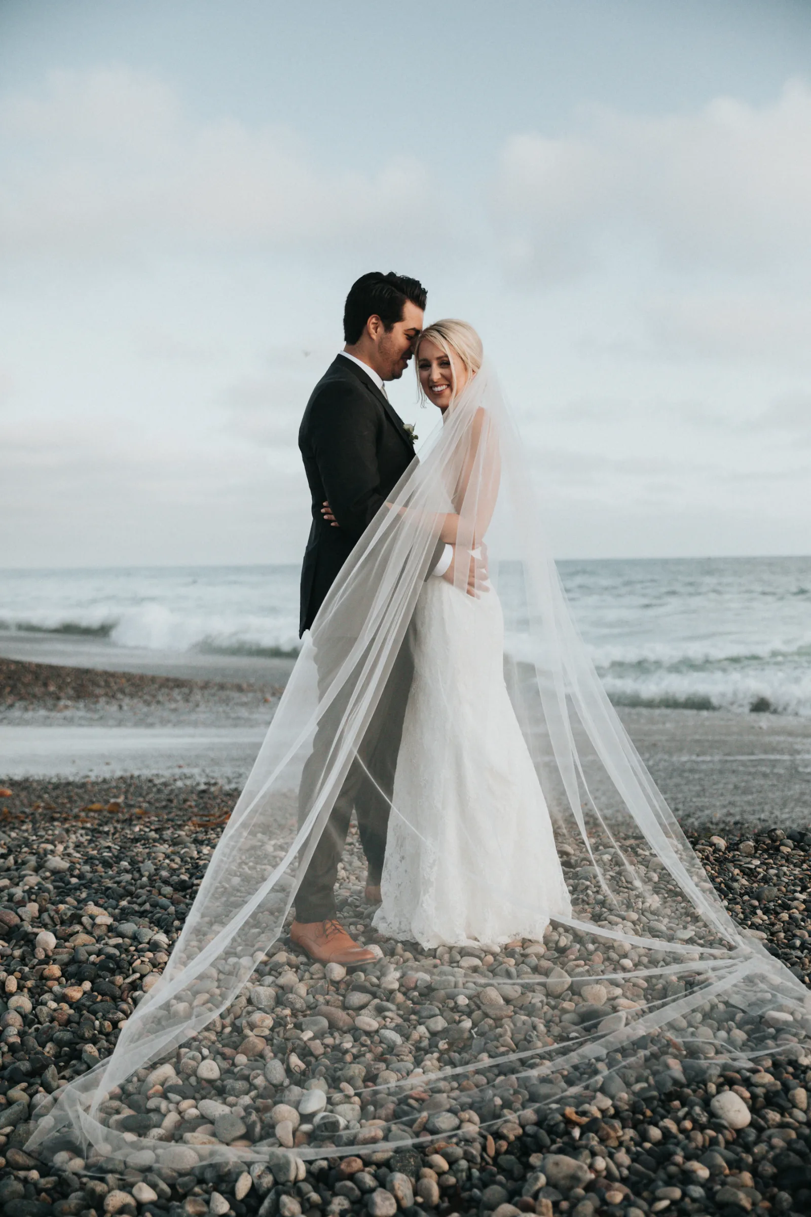 A coastal wedding moment, editorial reference